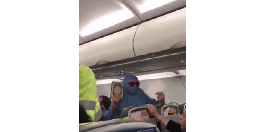 YOLCU UÇAĞINDA HAREKETLİ ANLAR