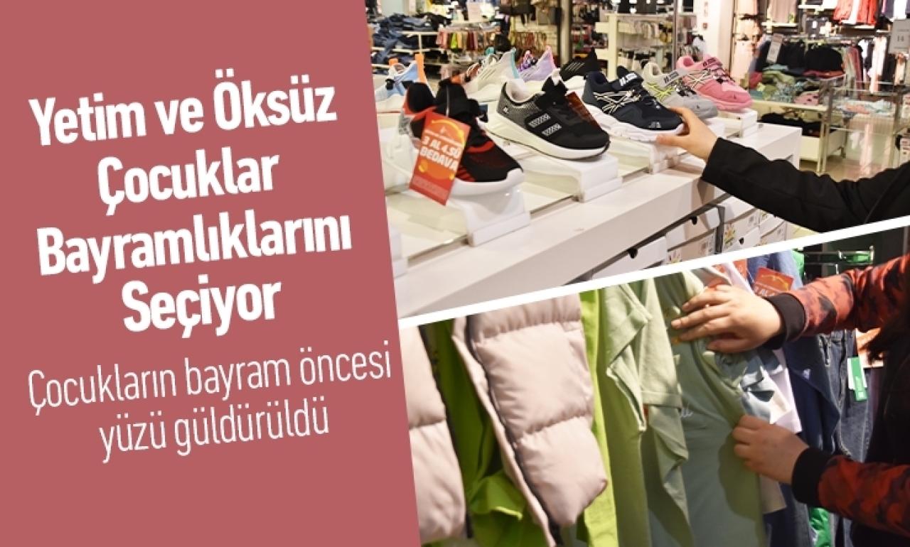 Yetim ve öksüz çocuklar bayramlıklarını seçiyor