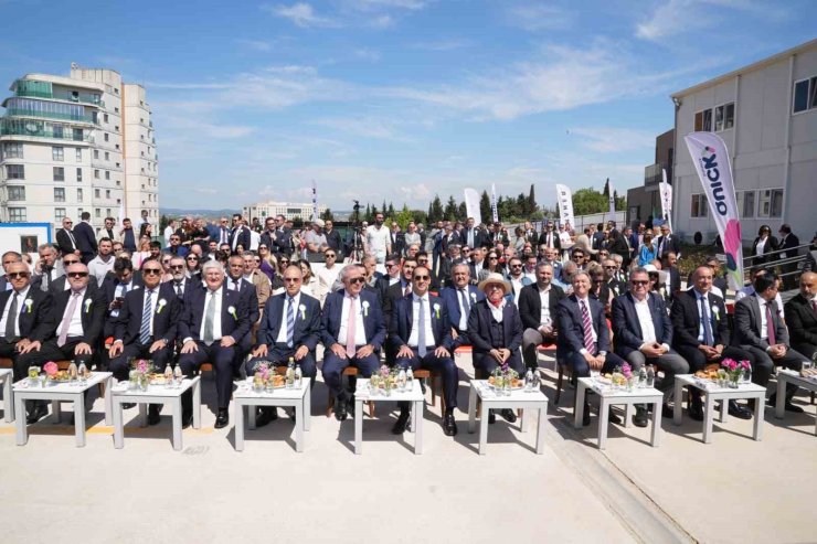 QFLATS’TE TEMEL ATILDI